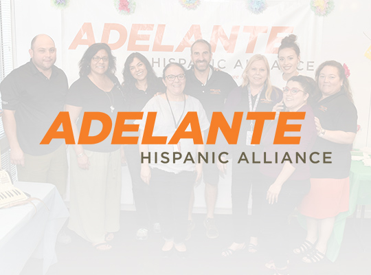 Adelante Hispanic Alliance logo with a group of hispanic people smiling