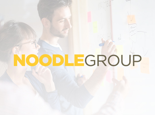 Noodle Group logo and an image of a man and a woman brainstorming on a board