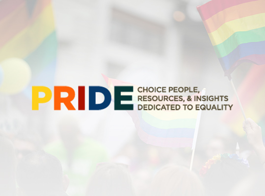 PRIDE logo and waving rainbow flags